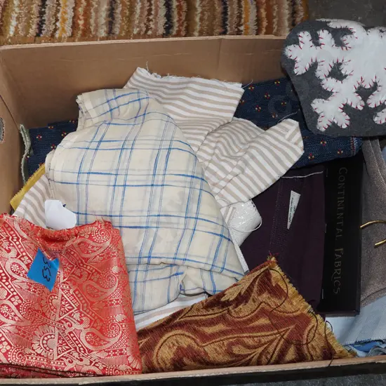 box of fabric pieces