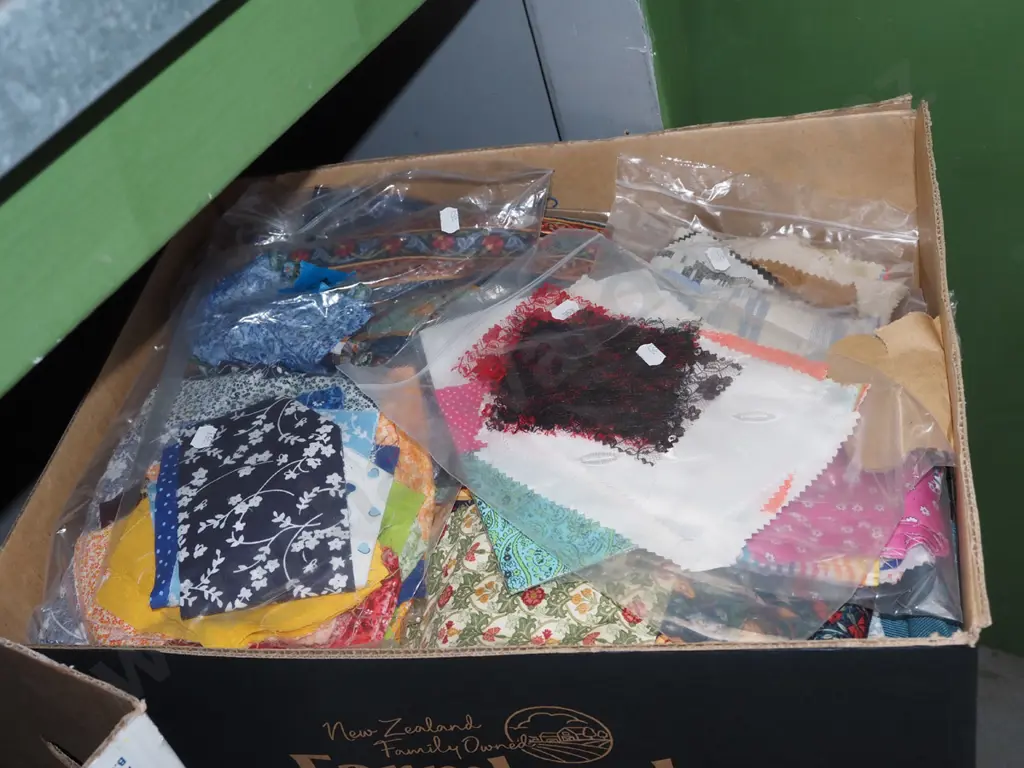 box of fabric pieces Image 1++