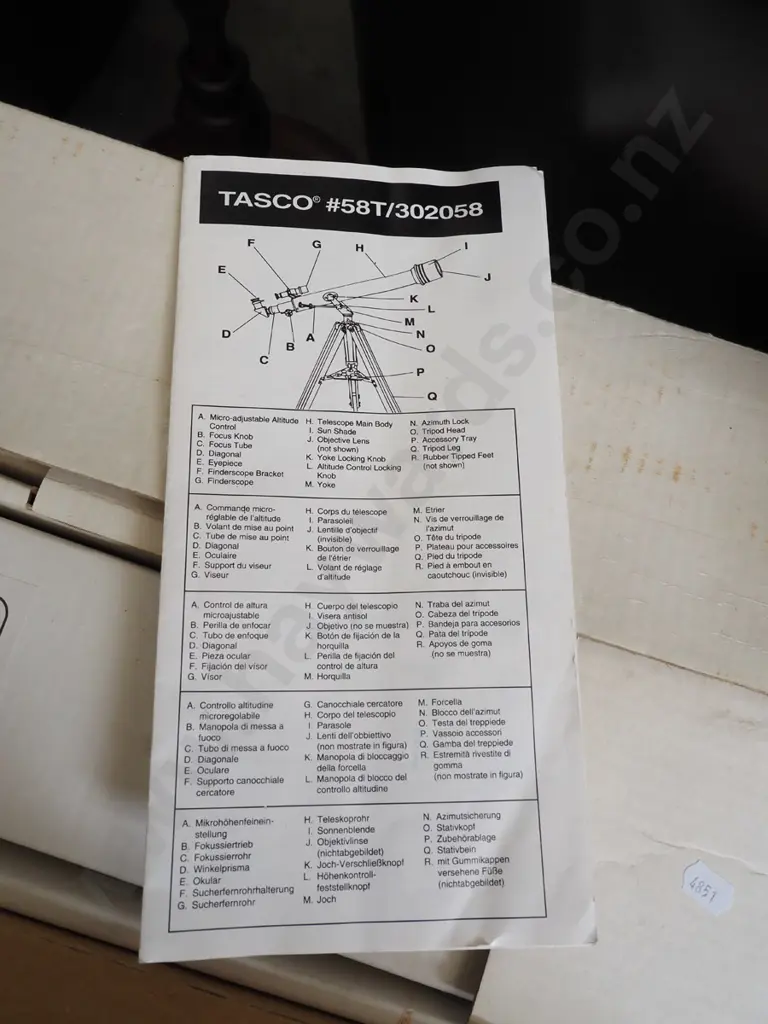box; Tasco telescope and accessories Image 1++