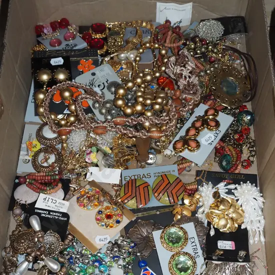 box of costume jewellery and clip on  earrings