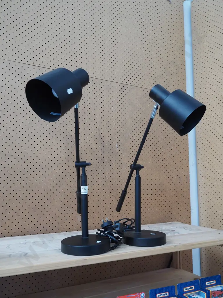 paitr of black adjustable bedside lamps Image 1++