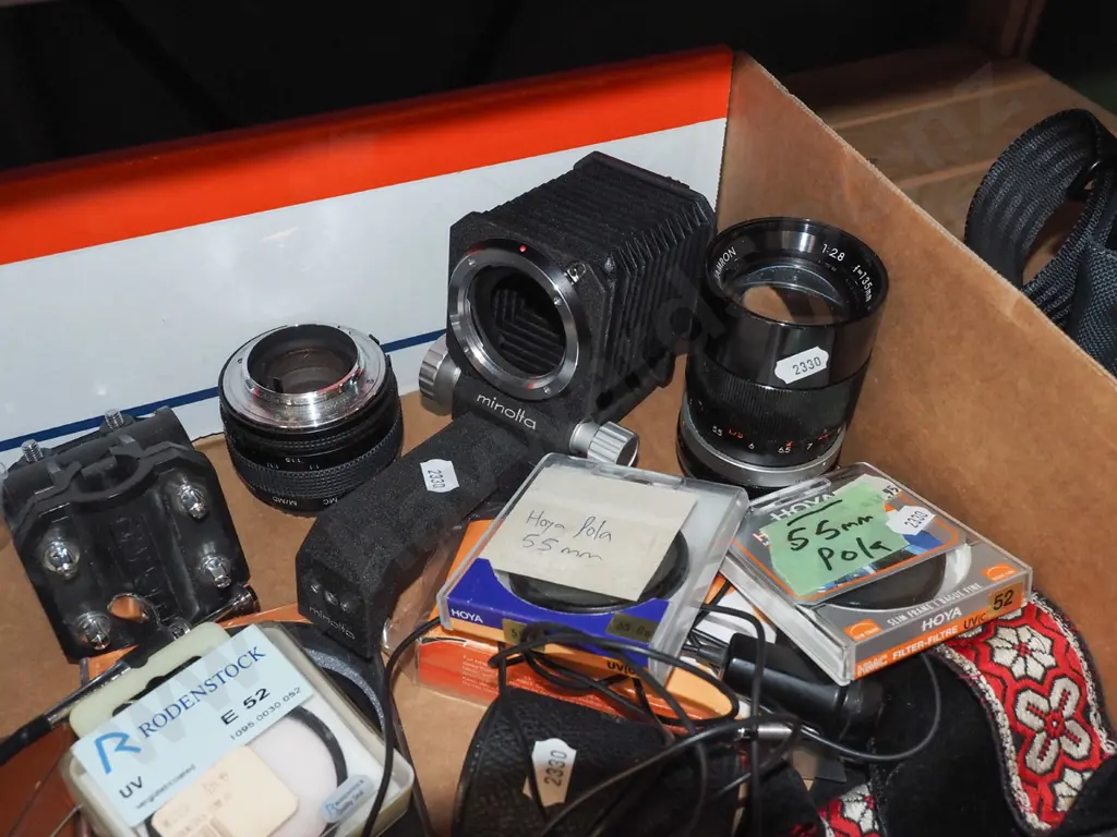 box; Minolta bellows, SLR lenses and accessories, filters, Lowepro camera bag etc. Image 1++