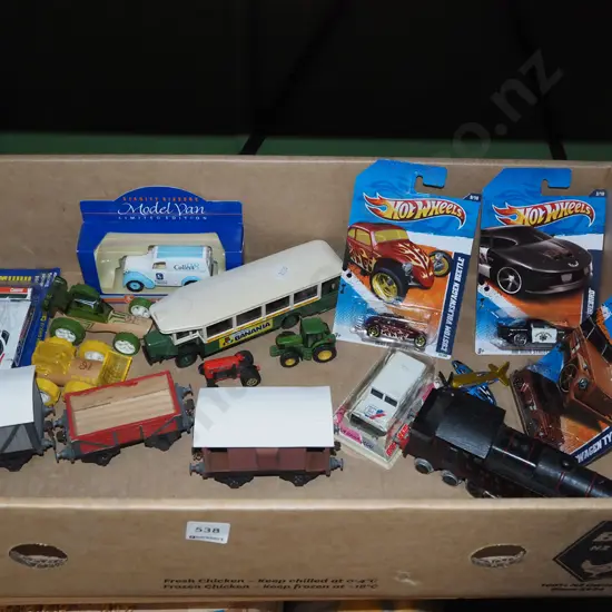 box of toy vehicles