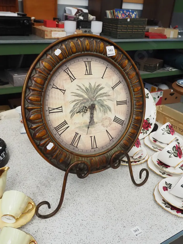 pressed metal framed wall clock on metal stand Image 1++