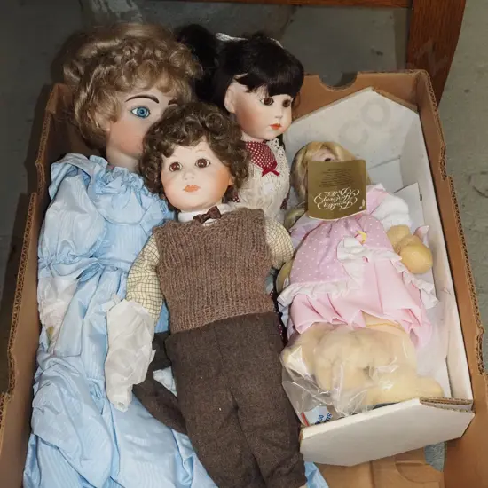 box of porcelain dolls