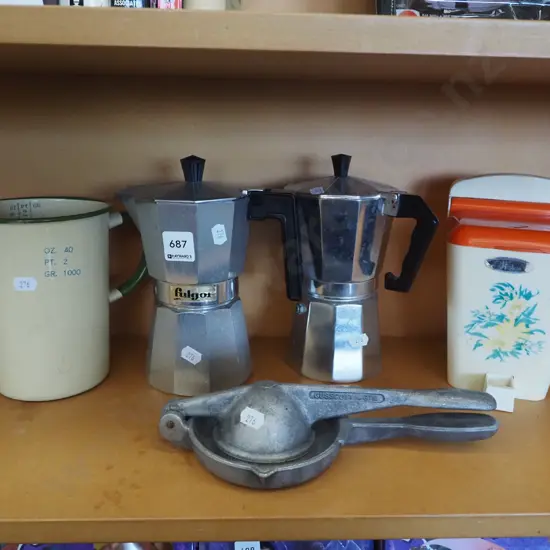 enamel measuring jug, 2x espresso makers, lemon squeezer, wall mounted storage container