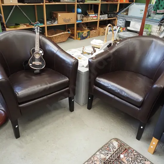 2x brown vinyl tub chairs - red dots