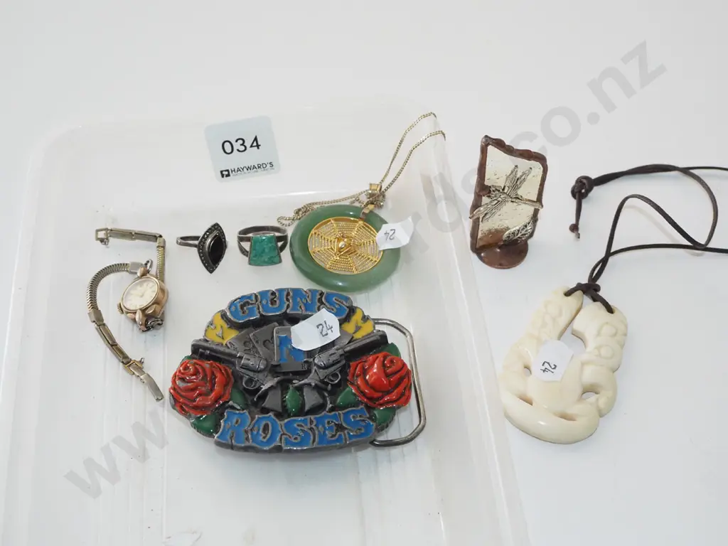 tray; belt buckle, wristwatch, carved tiki etc Image 1++