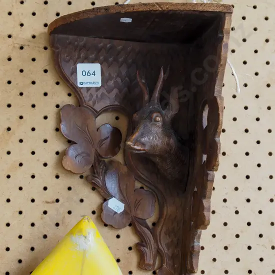 carved corner shelf