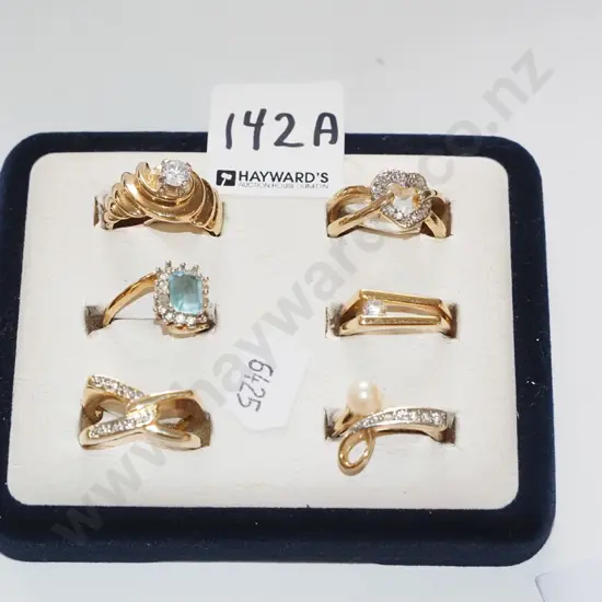 6x dress rings in ring holder
