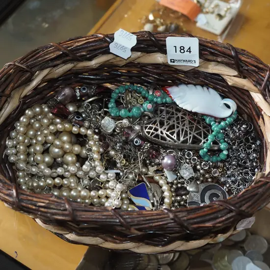 cane basket and costume jewellery