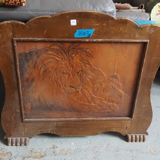 wood and tooled leather fire surround - sleeping lions H800 W870