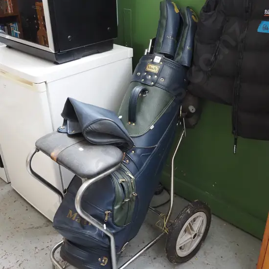 golf clubs and trundler
