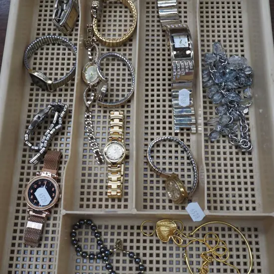 cutlery tray and watches, necklaces, bracelet