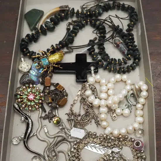 box of costume jewellery; brooches, crucifix etc