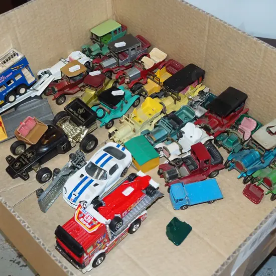 box of toy vehicles