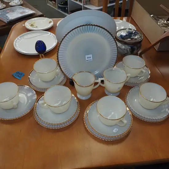 milk glass and gold tea set