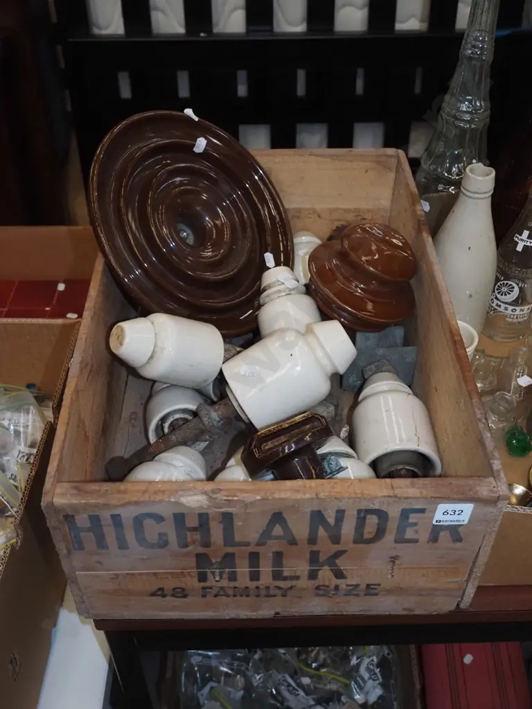 wooden Highlander milk crate, various electric insulators Image 1++