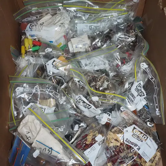 box; electrical items, transistors, light bulbs, plugs etc