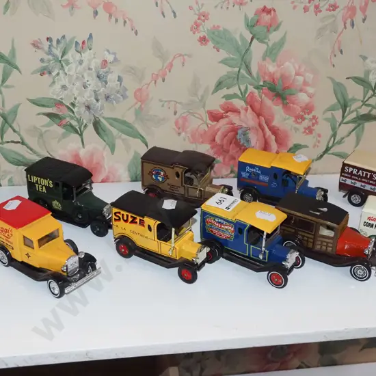 shelf of 10 model vehicles