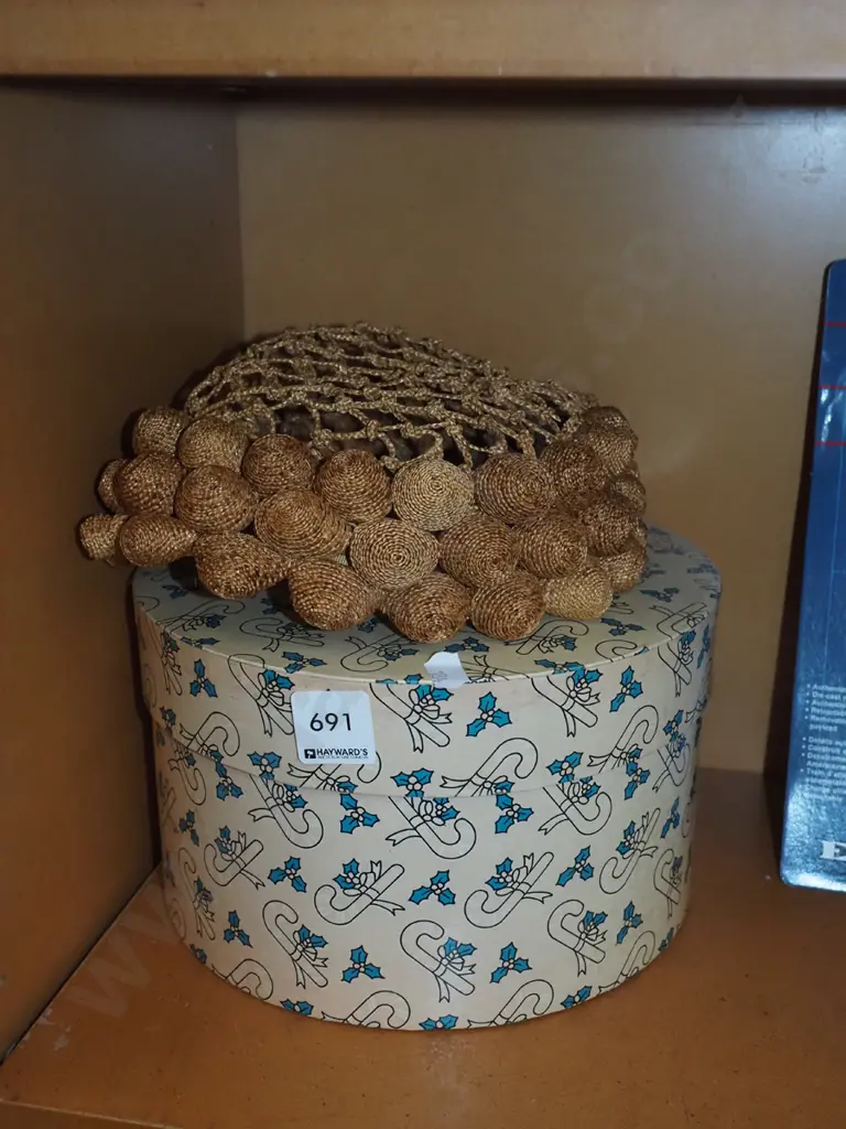 small box, unusual hat Image 1++