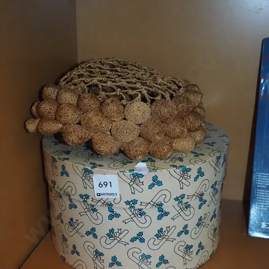 small box, unusual hat