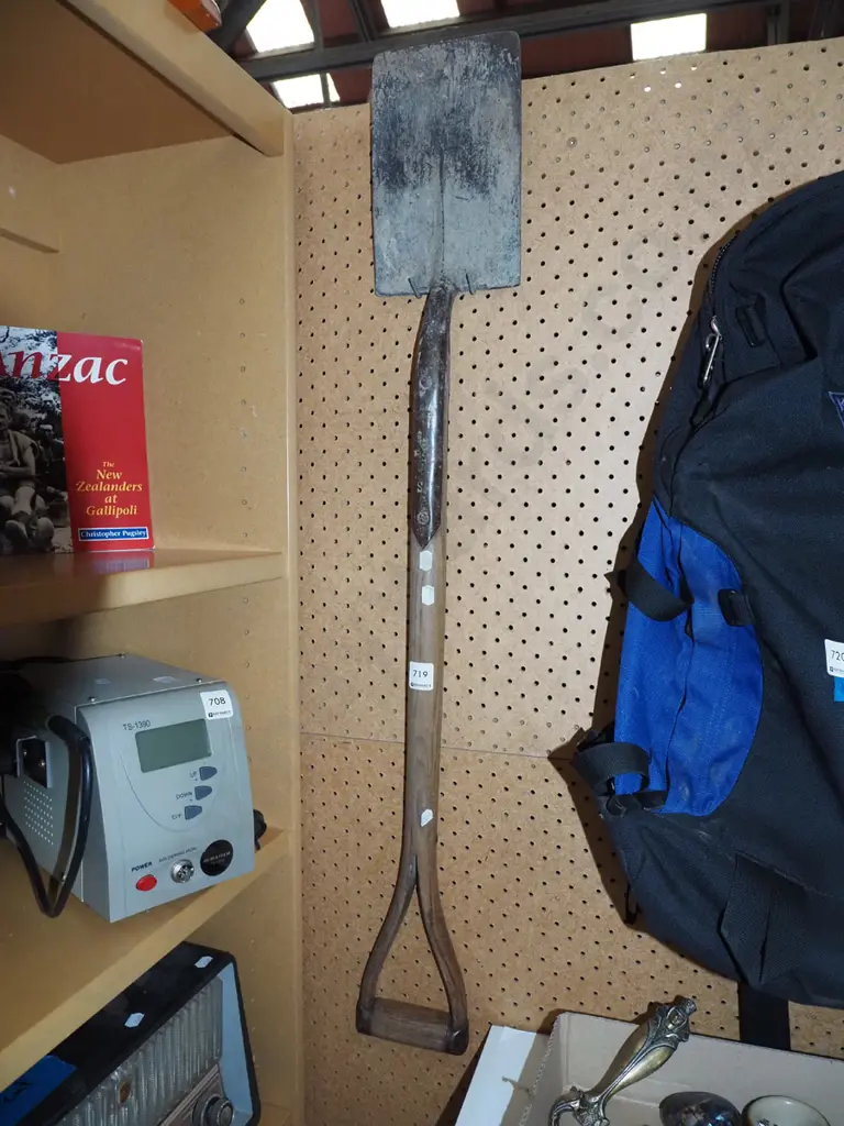 small wooden handled spade - head is buckled Image 1++