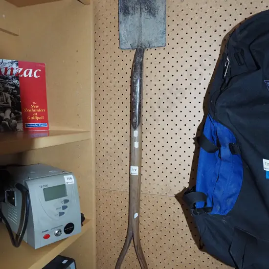 small wooden handled spade - head is buckled