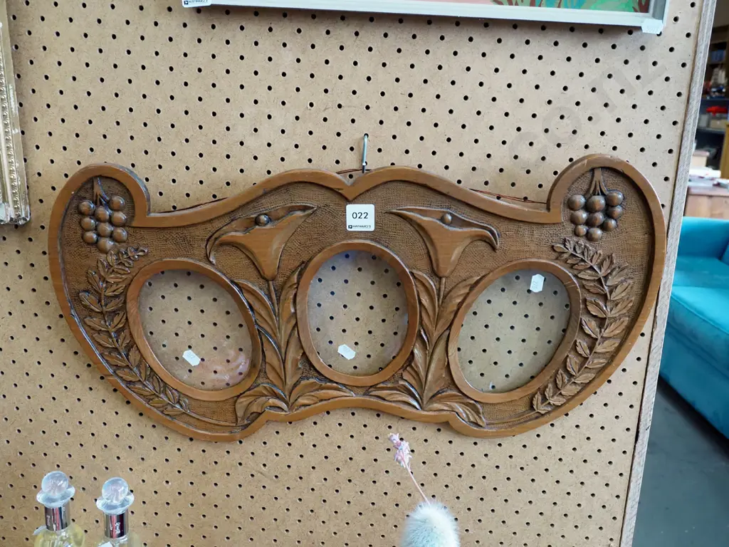 heavily carved wooden triptych photo frame Image 1++