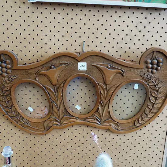 heavily carved wooden triptych photo frame