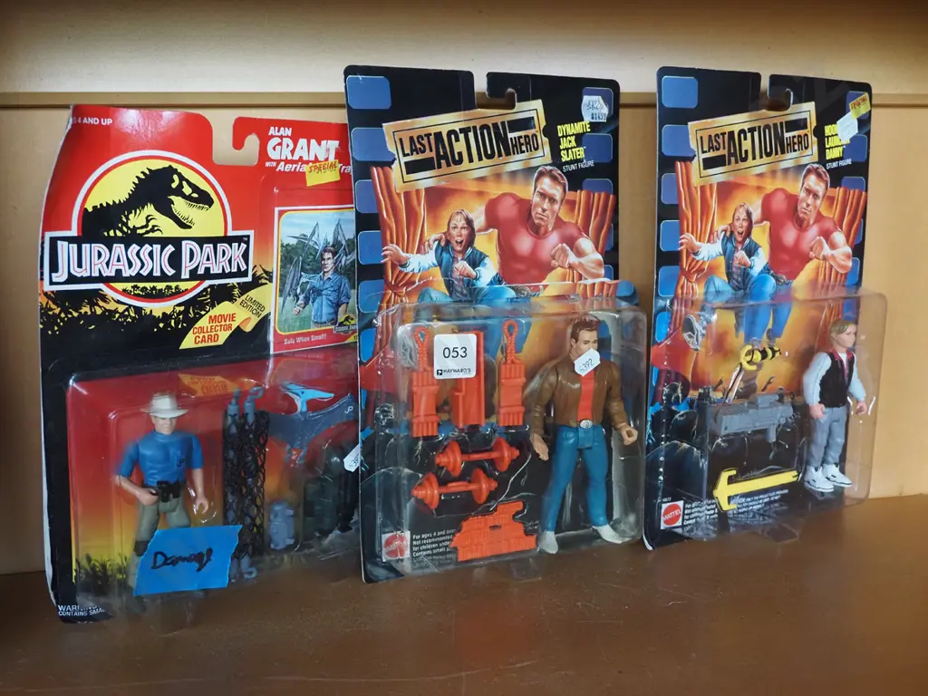 2x Last Action Hero carded figurines, 1x Jurassic Park figurine - damage to box Image 1++