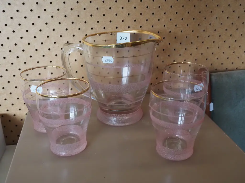 pink and gold rimmed water jug and 4 tumblers Image 1++