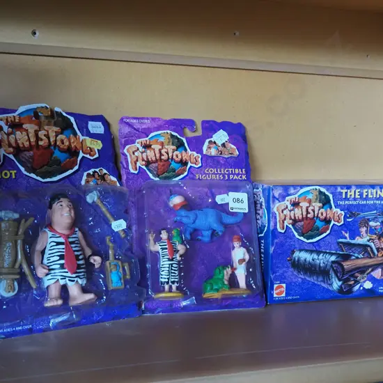 2x carded Flintstones figurines, Flintstones model vehicle