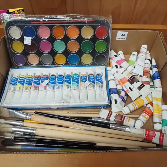 box of artists supplies, watercolours, brushes etc