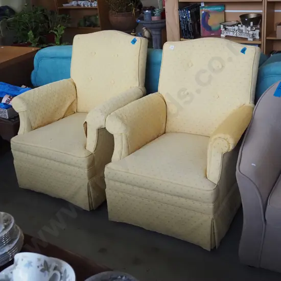 2x yellow upholstered deep buttoned armchairs 