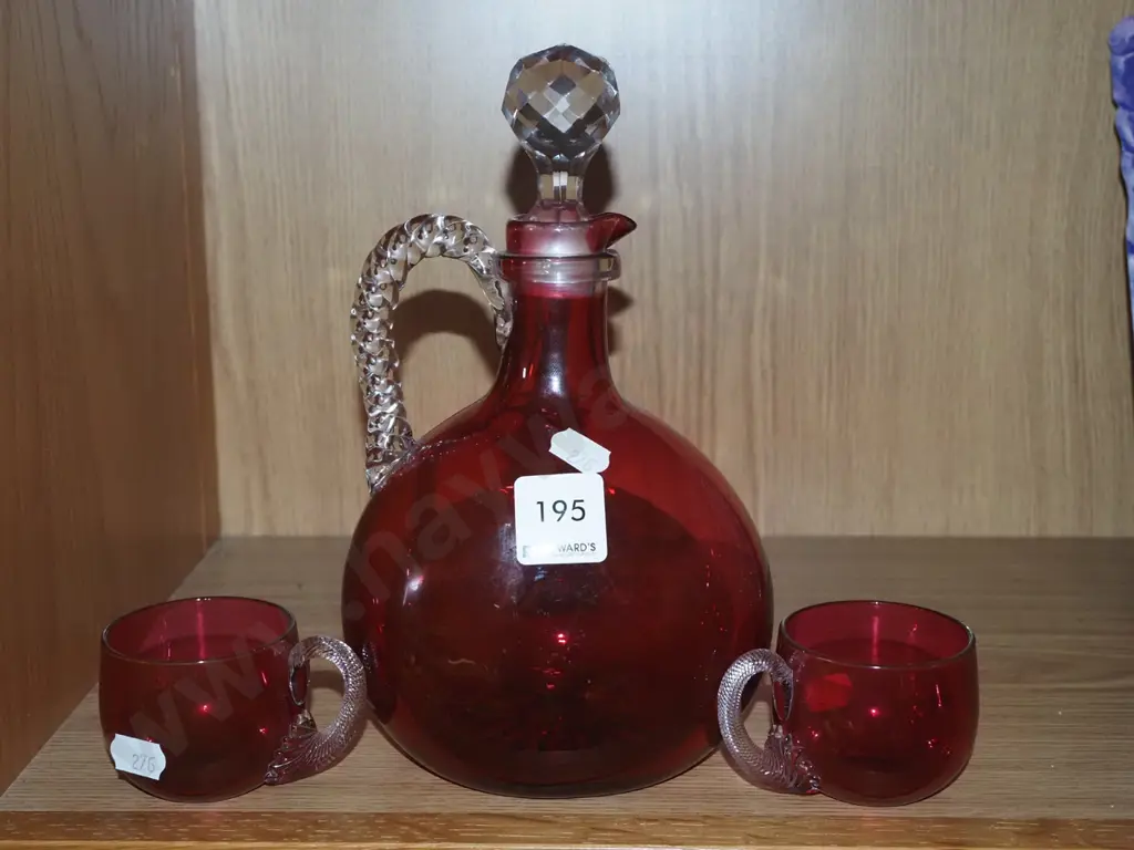 red glass stoppered bottle decanter, 2x small cups Image 1++