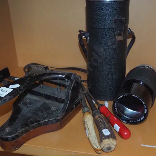 vintage hole punch, steels, SLR camera lens