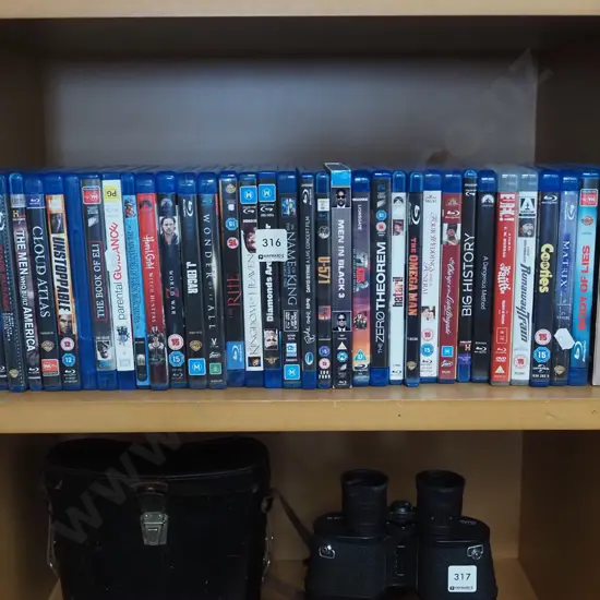 shelf of blue ray DVDs