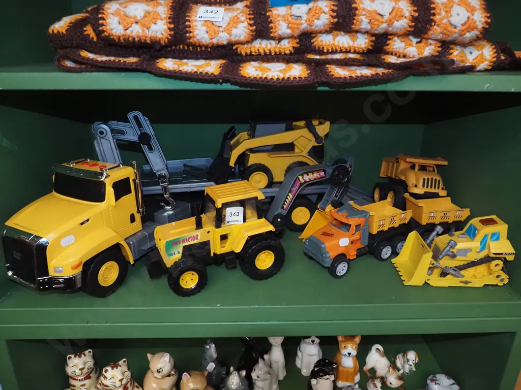 shelf of toy vehicles Image 1++