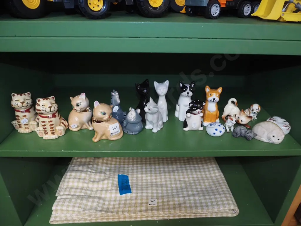 shelf of cat figurines, salt and peppers Image 1++