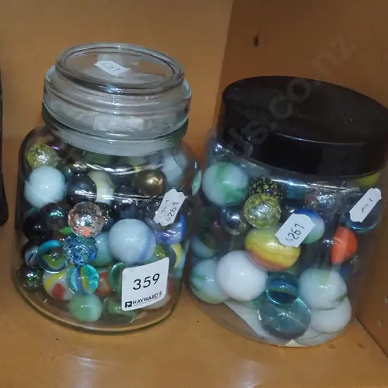 2x lidded canisters, marbles