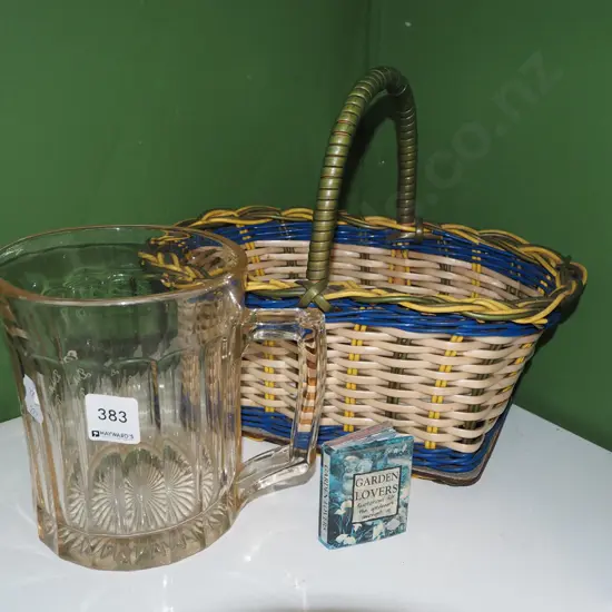 Dunedin Brewery glass jug, woven plastic basket