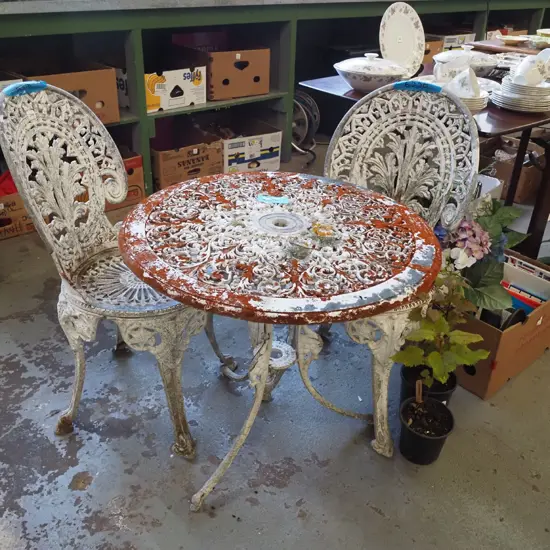 pressed alloy outdoor table and 2 chairs