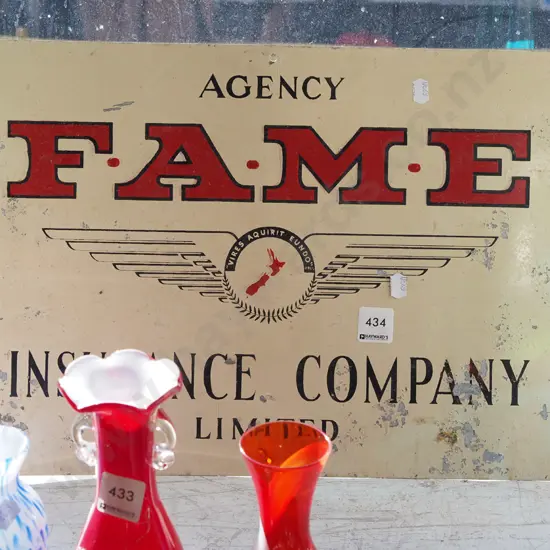 hand painted FAME insurance sign