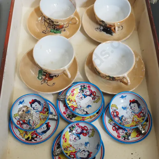 miniature tea cups and saucers
