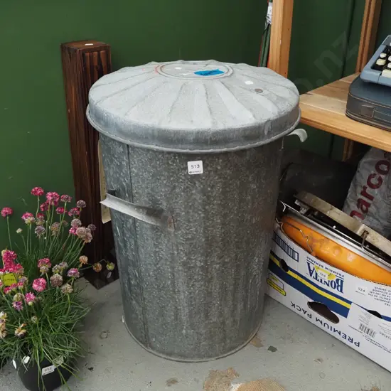 galvanised lidded ash can