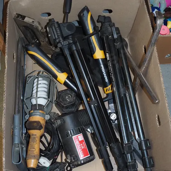 box; trouble light, hedge trimmers, camera tripods etc