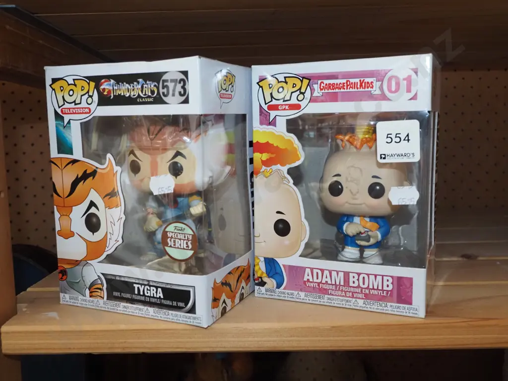 2x carded Pop figurines - Tygra, Adam Bomb Image 1++