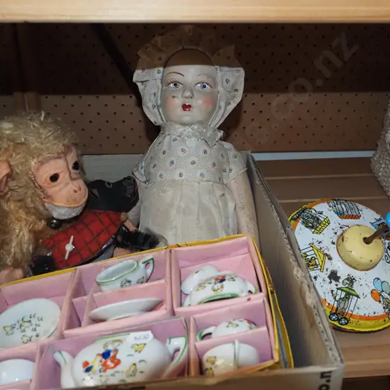 box; childs tea set, spinning top etc