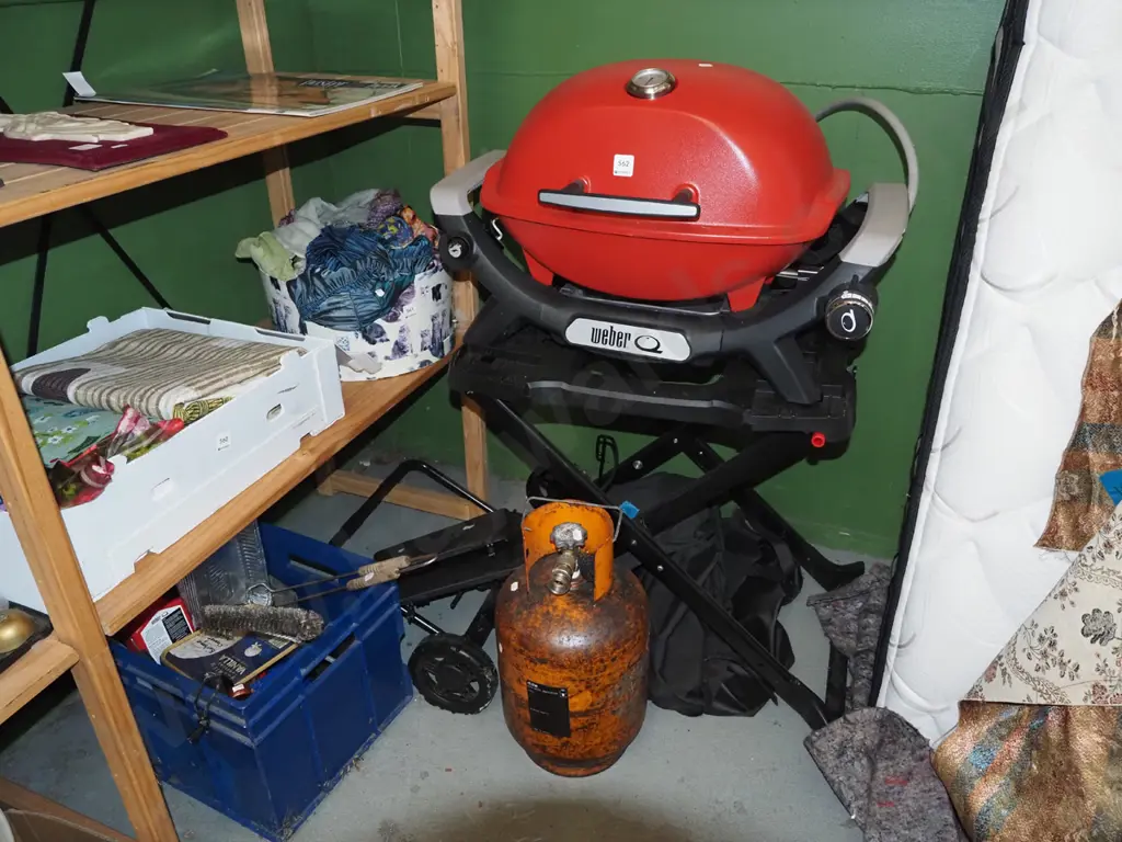 Weber bbq on foldaway trolley, gas bottle, blue tub of accessories - needs a clean Image 1++